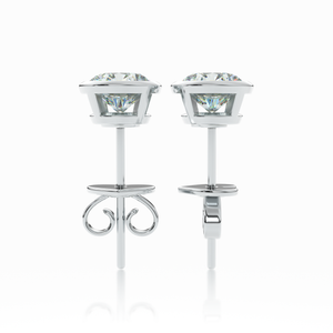 Close-up side view of ALBA earrings in white gold with smooth bezel setting