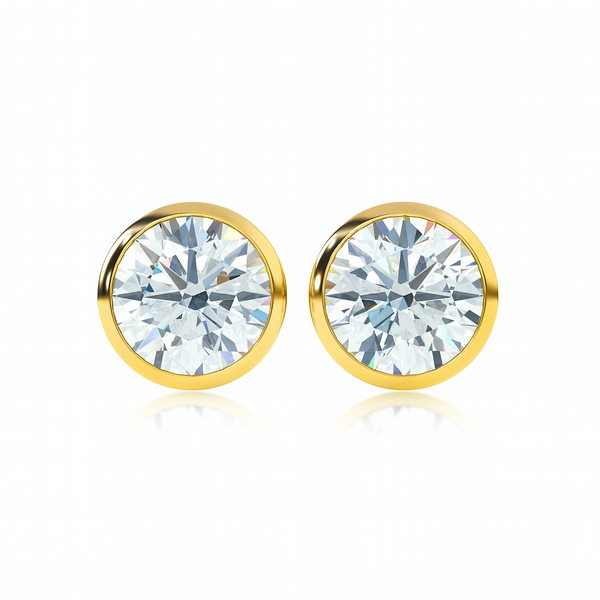 Close-up of ALBA earrings in yellow gold with smooth bezel setting