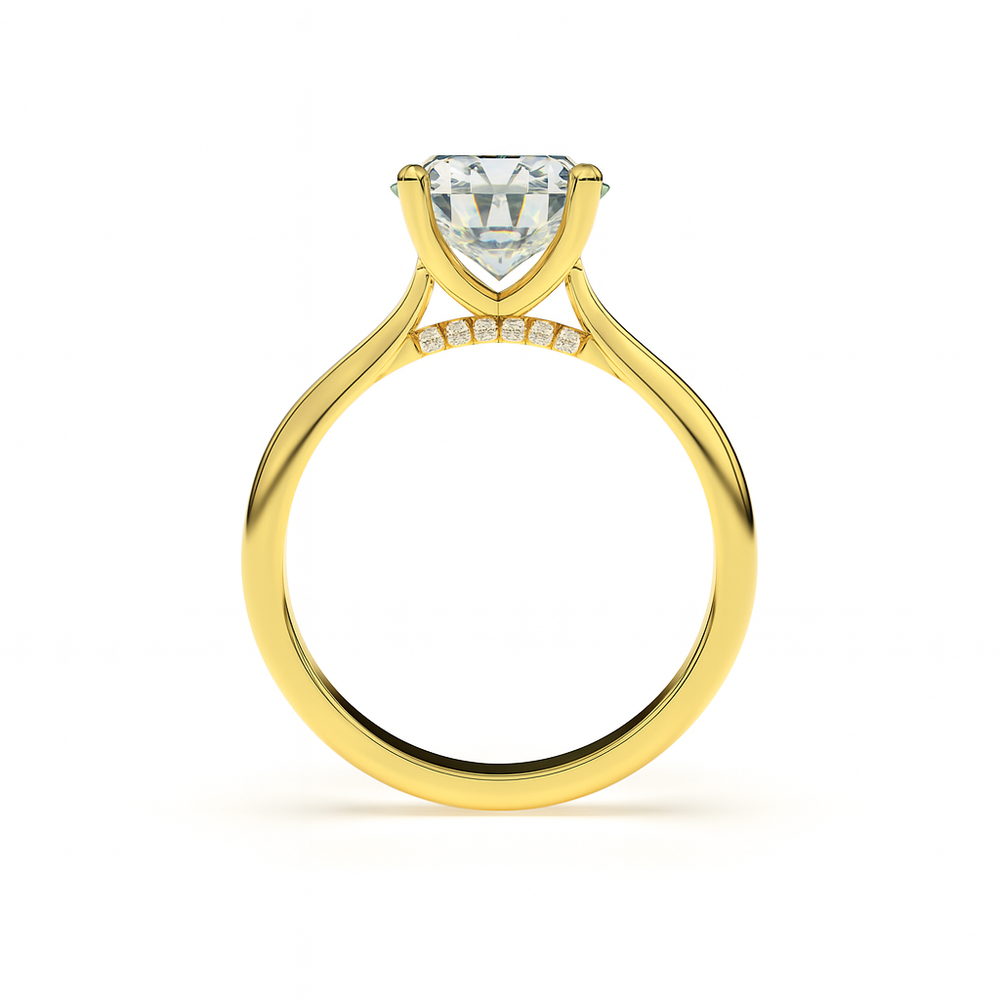 Side profile of ÉLODIE ring in yellow gold with hidden pavé diamonds