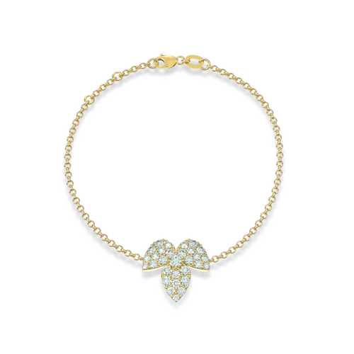 Close-up of GLACE bracelet in yellow gold with glacier-inspired centerpiece