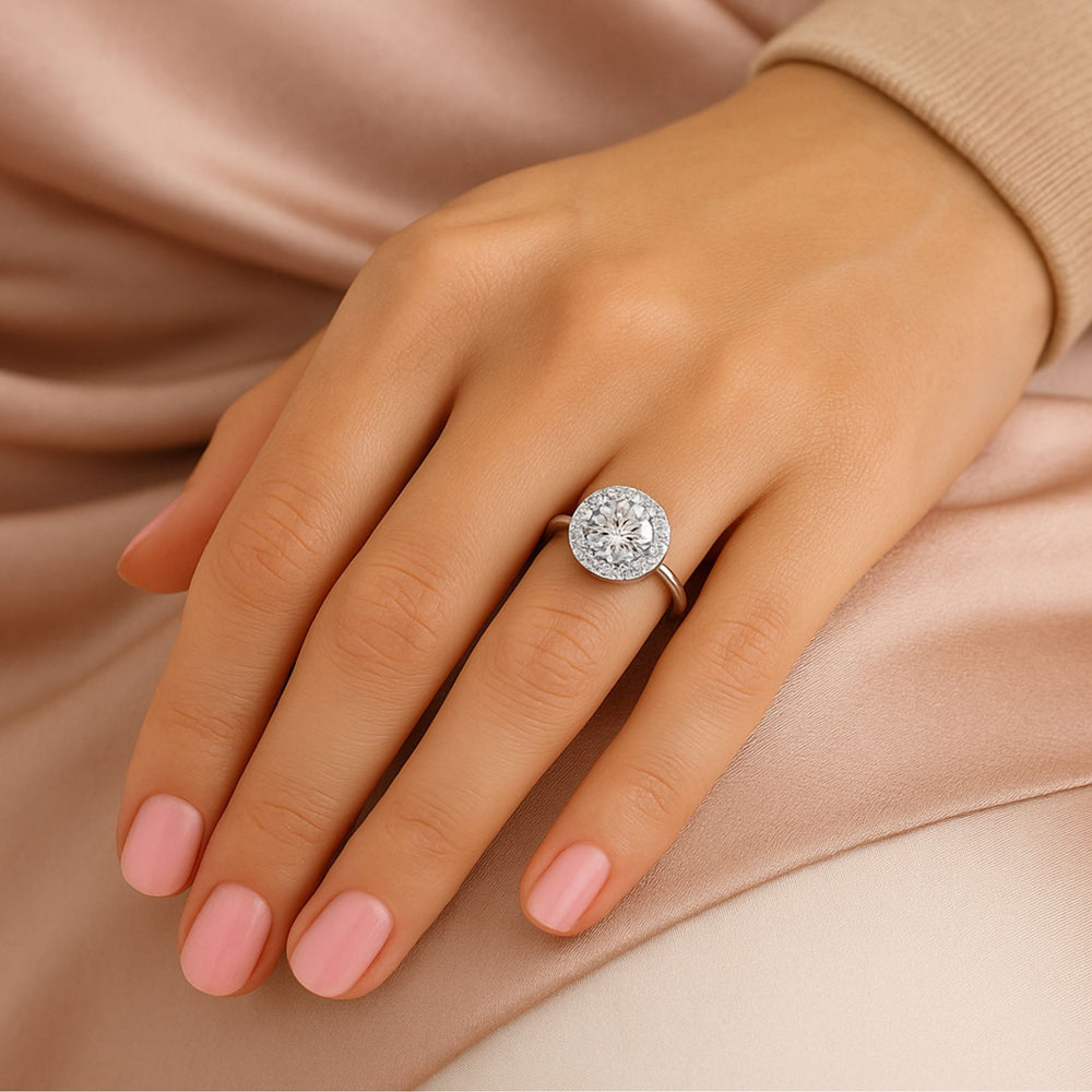 Close-up of LILOU engagement ring showing hidden diamond detail in white gold